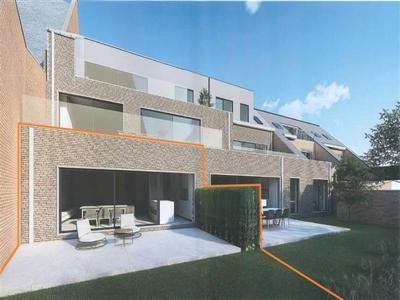 Gelijkvloers nieuwbouw appartement met overdekte autostaanpl