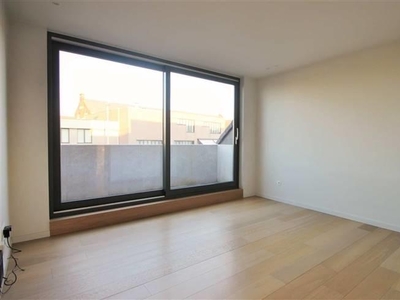 Trendy triplex-appartement met zeer centrale ligging, ideaal