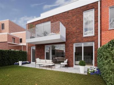 Gelijkvloers appartement met tuin, 2slk en parking!