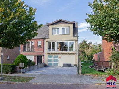 Ruime HOB met 3 slaapkamers, garage en tuin