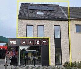 Nieuwbouwappartement met ruim terras en autostaanplaats