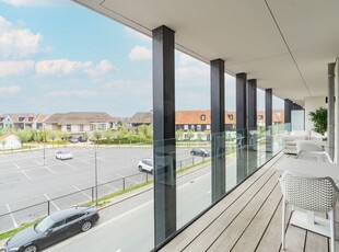 Recent appartement met parking en mooie zonneterrassen te K