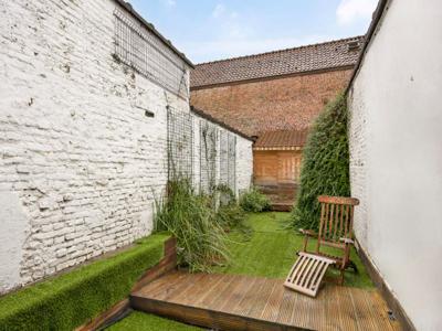 Leuke rijwoning met 4 slaapkamers en een tuin