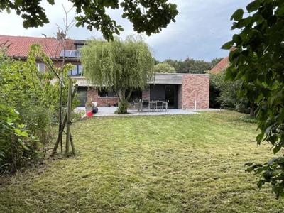 Uitgebouwde woning op 797m² aan de rand van Gemene Weidebeek