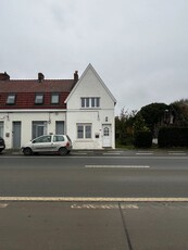 Halfopen woning met 2 slaapkamers, tuin en veranda