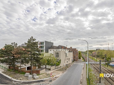 Opbrengsteigendom: 6 appartementen en 4 garages