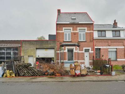 WONING MET MAGAZIJN EN TUIN