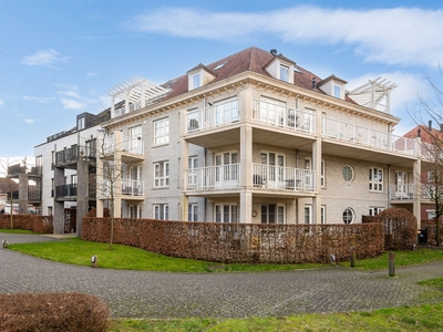 Energiezuinig appartement met 4 slaapkamers, 2 badkamers, terras en garage.