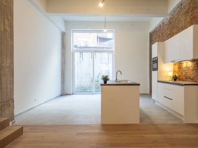 Gelijkvloerse loft (160m²) te koop in hartje Kortrijk