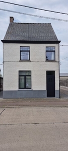 Totaal gerenoveerde woning in open bebouwing