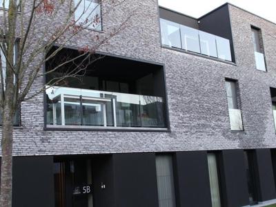 Mooi tweeslaakamerappartement met ondergrondse garageplaats