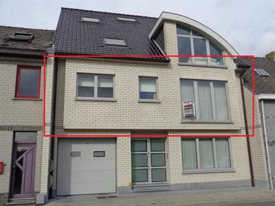 Rustig gelegen appartement met groot terras en garage