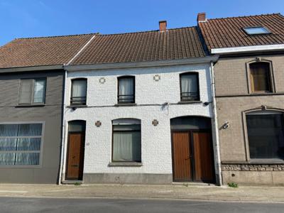 Centraal gelegen STADSWONING met 2 slaapkamers en tuin