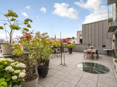 Luxe appartement met 100m² terras