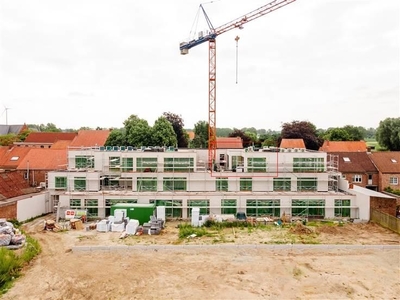 Zonnig dakappartement met 2 slaapkamers en riant terras