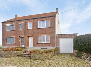 Gezinswoning met 4 slaapkamers, garage en tuin