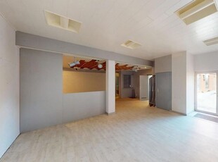 Polyvalent pand met magazijn+groot appartement op toplocatie