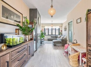 Uitstekend onderhouden rijwoning met grote tuin