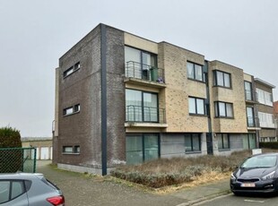 Ruim twee slaapkamerappartement met tuin en garagebox