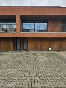 Triplex met 1 slaapkamer en terras in het centrum van Alken.