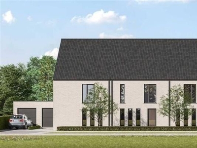 Halfopen bebouwing met 3 slpks, tuin en garage te Aarschot