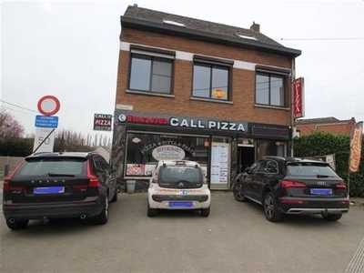 Woning met handelspand te koop