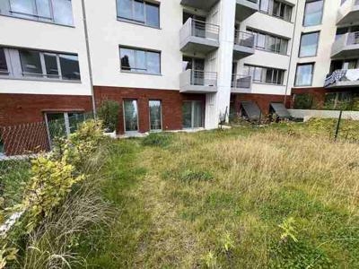 Begane grond 1 slaapkamer met terras en tuin in nieuw gebouw