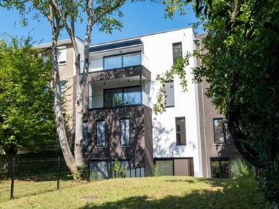 Nieuw in Waterloo - 4 eenheden gebouw met terras / tuin