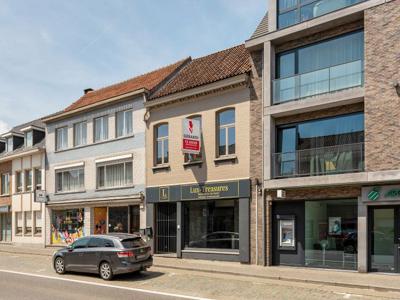 Winkelpand met duplex appartement en tuin