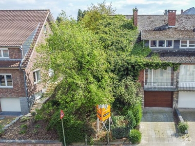 Driegevelwoning met 4 slaapkamers, garage, terras en tuin!