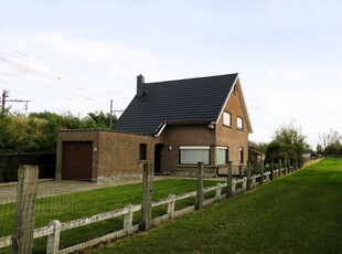 Welle, Woning met 3 SLPKs, garage en tuin.