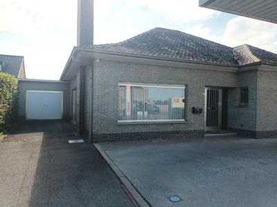 Open woning met aansluitende loods