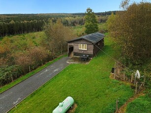 Chalet in een agrarisch gebied zonder bouwvergunning bestemd