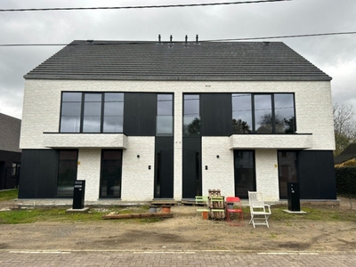 Duplex appartement met terras en staanplaatsen in Zonhoven.