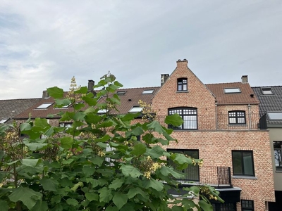 Nieuwbouw duplexappartement in authentiek gebouw met terras