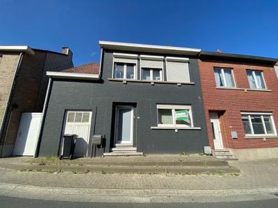 Ruime gezinswoning met drie slaapkamers en tuin